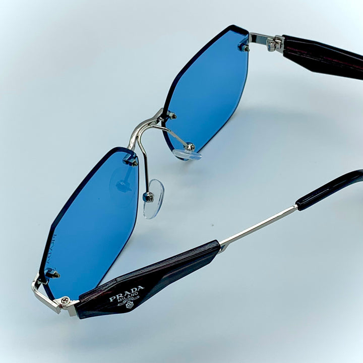 Solaires: Prada Blue Frame