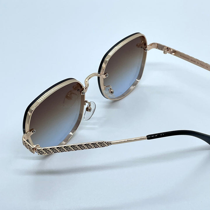 Solaires: Burberry Clip Gold