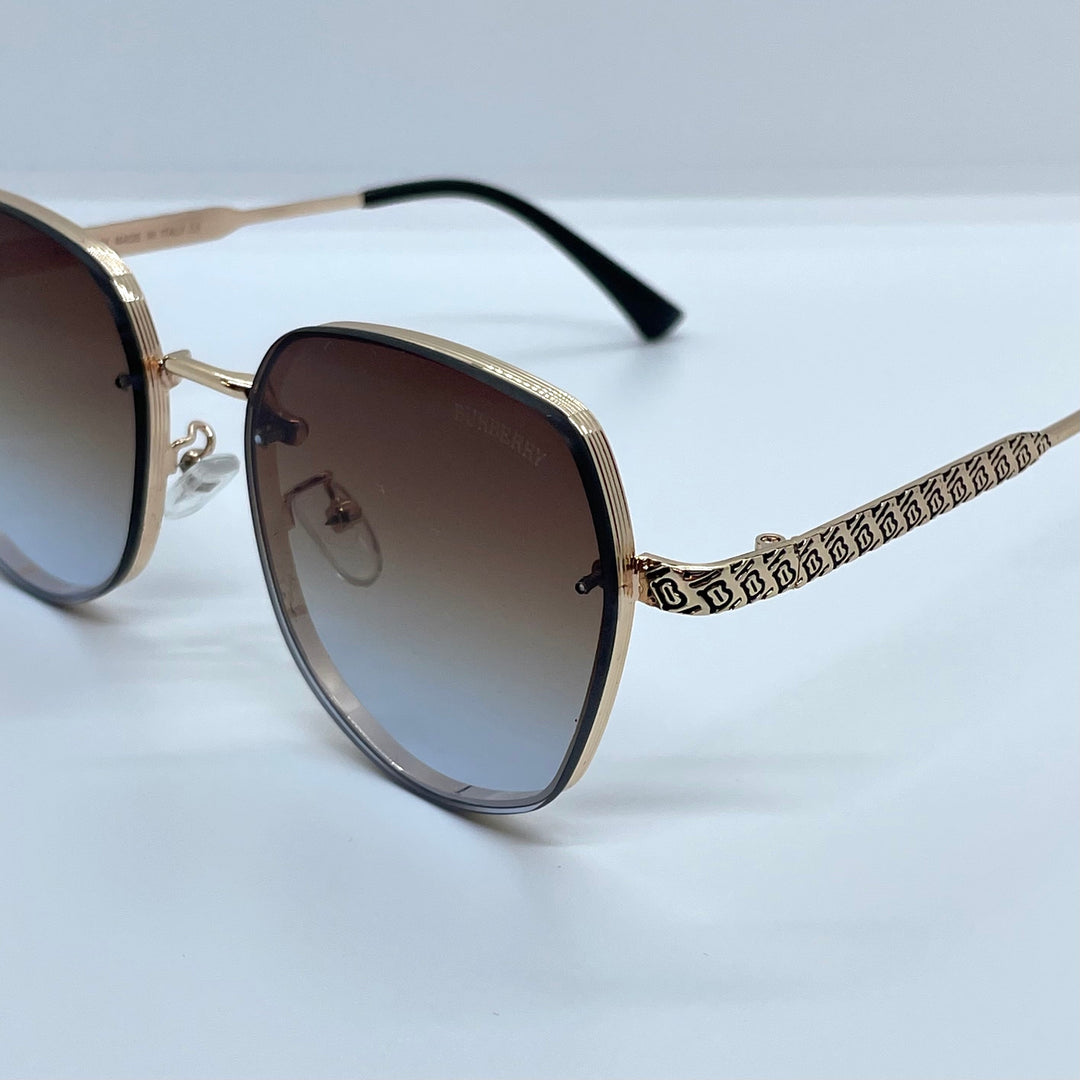 Solaires: Burberry Clip Gold