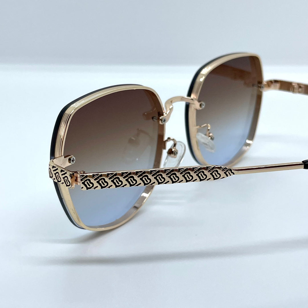 Solaires: Burberry Clip Gold