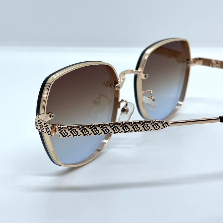 Solaires: Burberry Clip Gold